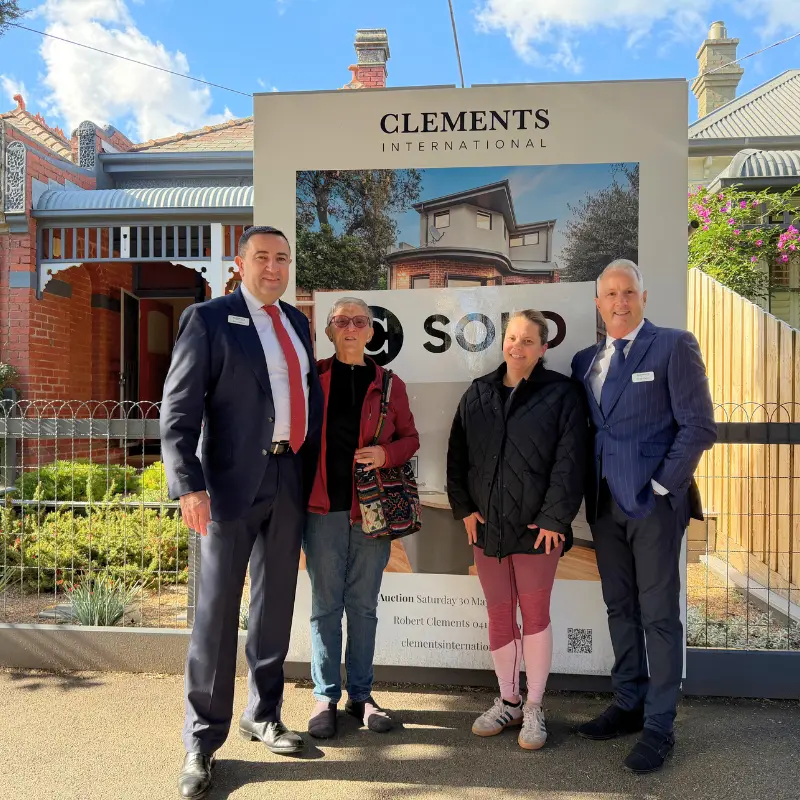 Robert Clements and Philip French of Clements International with the vendor and buyer at 27 Davison Street, Richmond, after a successful sale